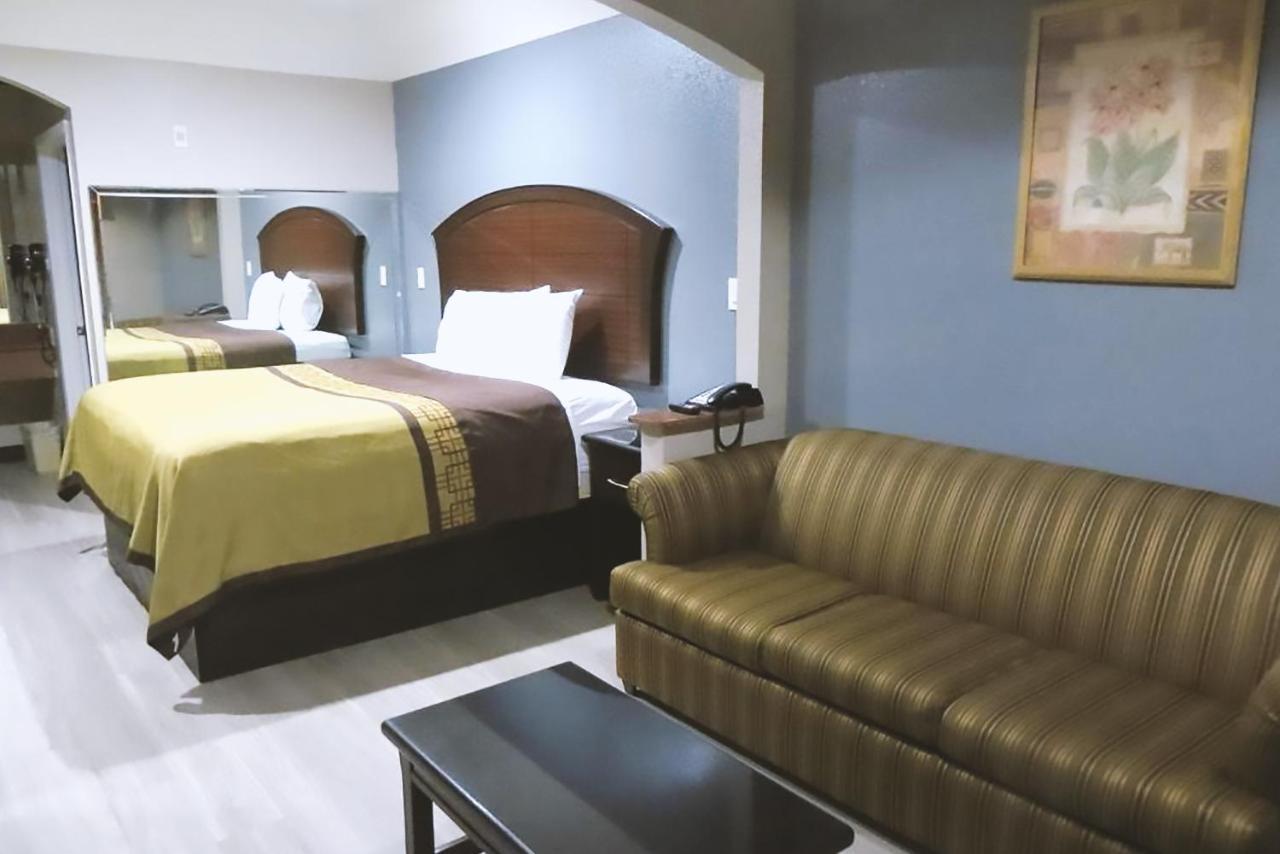 Blue Way Inn & Suites By Jasper Houston Bagian luar foto