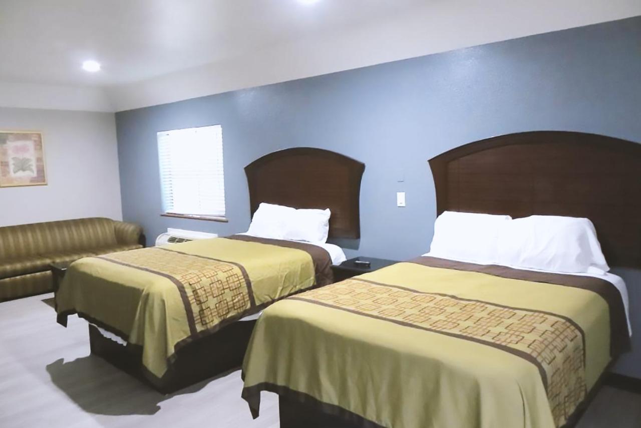 Blue Way Inn & Suites By Jasper Houston Bagian luar foto